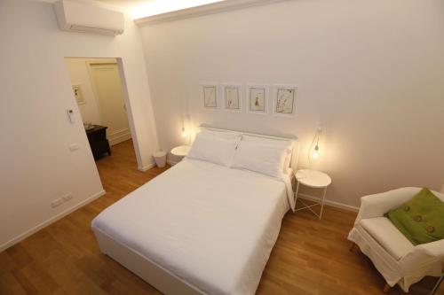 Postel nebo postele na pokoji v ubytování Pisacane61 B&B