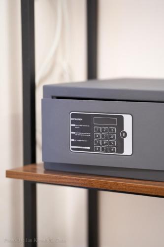 a microwave sitting on top of a wooden table at Griffin Hotel and Suites in Cebu City