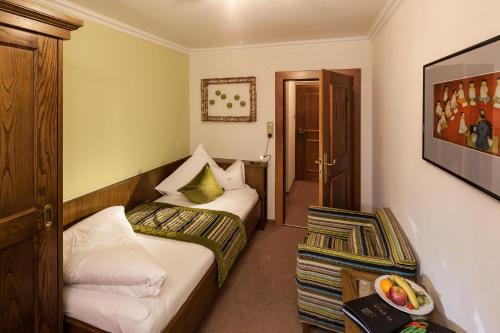 Katil atau katil-katil dalam bilik di Hotel & Chalet Montana