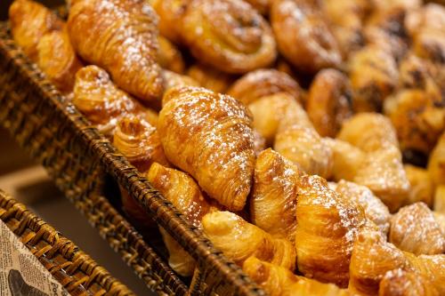 a pile of pretzels and other pastries on display at Aimia Hotel in Port de Soller