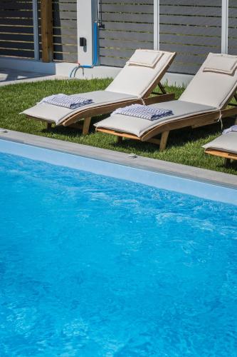 Bazén v ubytování Lighthouse Villas Kefalonia nebo v jeho okolí