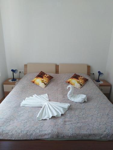 Llit o llits en una habitació de Apartma Viktorija