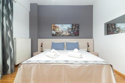 Postel nebo postele na pokoji v ubytování Hermes by Heloni Apartments