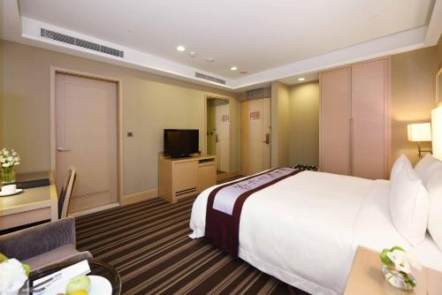 TV a/nebo společenská místnost v ubytování Fullon Hotel Taipei, East