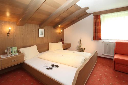 Postel nebo postele na pokoji v ubytování Gasthof Weißkugel