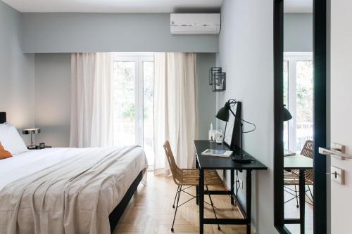 Posteľ alebo postele v izbe v ubytovaní Peaceful 2BD Apartment in Kolonaki by UPSTREET