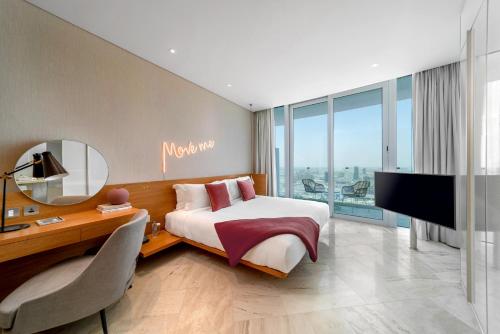 Säng eller sängar i ett rum på FIVE Jumeirah Village
