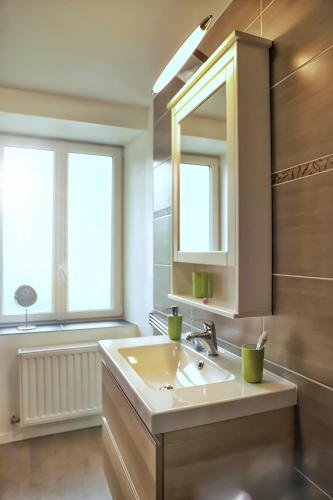 Ein Badezimmer in der Unterkunft L’Échappée Verte