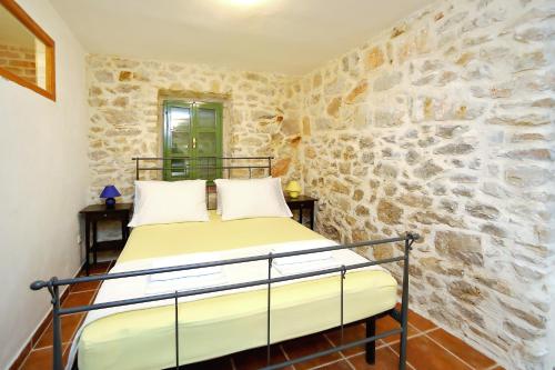 Postel nebo postele na pokoji v ubytování Villa Kamena