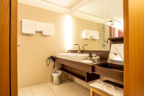 Un baño de Sonne Mellau - Feel good Hotel