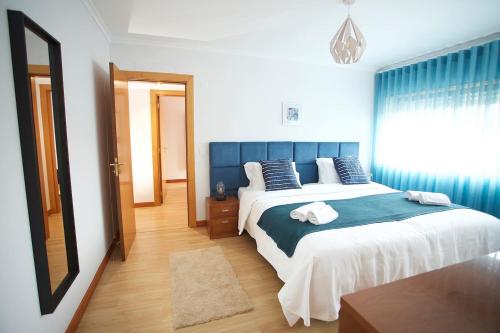 Uma cama ou camas num quarto em Meriteluna Mountain - Lisboa, Sintra e Cascais