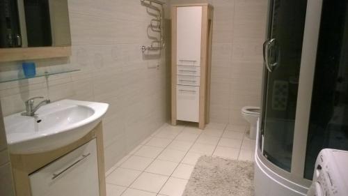 Ванная комната в Апартаменты в сосновом бору