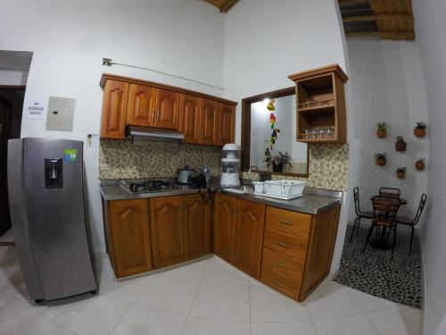 Kuchyň nebo kuchyňský kout v ubytování Fami Hotel Vive Jardin