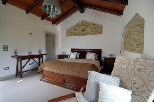 Кровать или кровати в номере Terre Di Garlenda