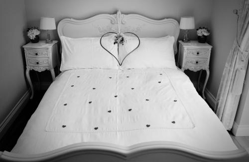 Ein Bett oder Betten in einem Zimmer der Unterkunft The Pavilion at Brunger House