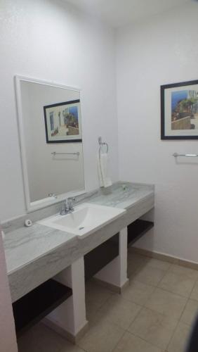 Ванна кімната в Hotel Palmas Teotihuacán