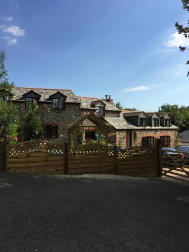 a wooden fence in front of a house at Ivy Cottage in Launceston