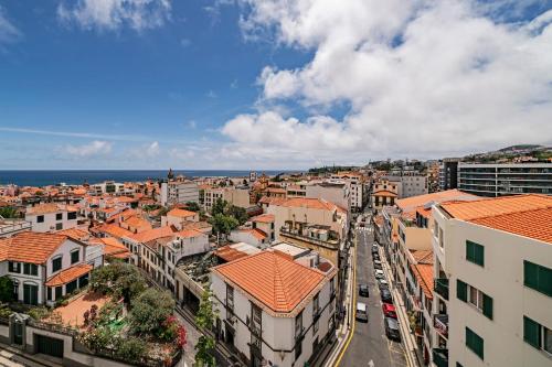 an aerial view of a city with buildings at Luxury View Apartment Funchal CENTRAL free parking FAMILIES in Funchal