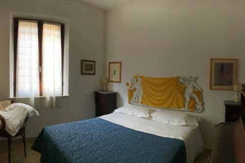 Posteľ alebo postele v izbe v ubytovaní To dream in Siena