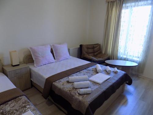 Postel nebo postele na pokoji v ubytování Hotel New Star