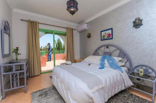 Postel nebo postele na pokoji v ubytování In Club Palmeraie Resorts
