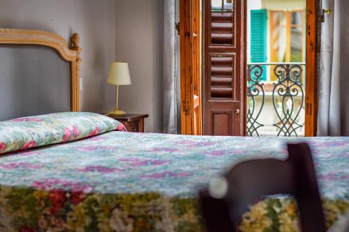 A bed or beds in a room at Hotel Medici