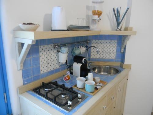 a toy kitchen with a stove and a sink at Raito Home costa d'Amalfi in Vietri sul Mare