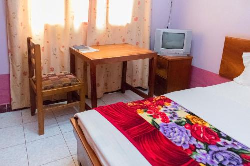 TV a/nebo společenská místnost v ubytování Starlight Hotel Mbale