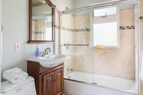 a bathroom with a sink and a shower at Spacious, Soaring Ceilings, Near Downtown MV, GOOG in Mountain View