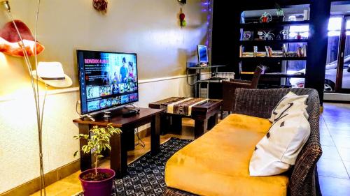 En TV eller et underholdningssystem på Reina Sofia, !Un lugar comodo y bello para compartir!