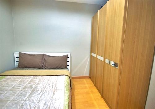 Postel nebo postele na pokoji v ubytování Risa Plus2