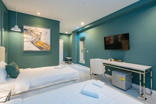 Belle Grand Hotelにあるベッド