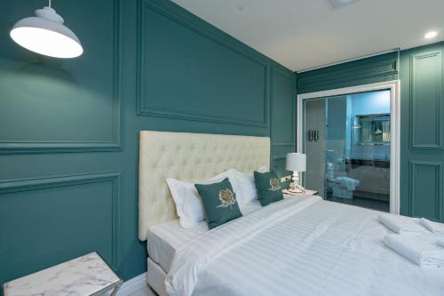Belle Grand Hotelにあるベッド