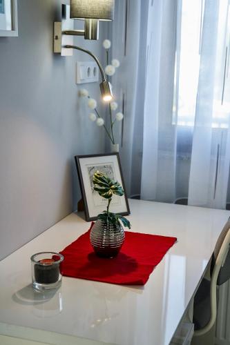 Ένα ή περισσότερα κρεβάτια σε δωμάτιο στο Grey Suites Pécs