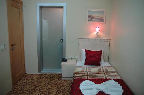 Katil atau katil-katil dalam bilik di Hotel Umit 2