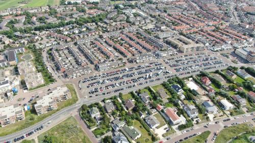 an aerial view of a city with parking lots at Hotel De Koningshof in Noordwijk aan Zee
