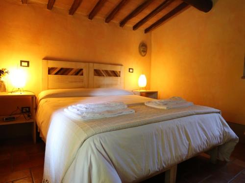 Katil atau katil-katil dalam bilik di Agriturismo Borgo Santa Maria