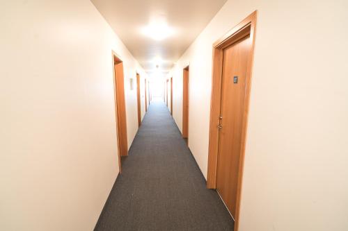 a corridor of corridors in an office building at Skulagardur Country Hotel in Garður