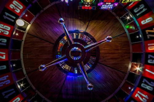 a view of a spiral staircase in a casino at Desert Palace Hotel in Upington
