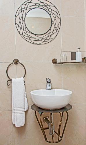 Un baño de Villa Le View Guesthouse