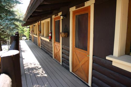 a wooden door on the side of a house at Heart Six Ranch in Moran