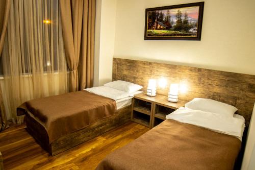 Irmisa Hotel Tbilisiにあるベッド