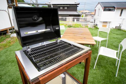 Barbacoa disponible para clientes en la casa o chalet