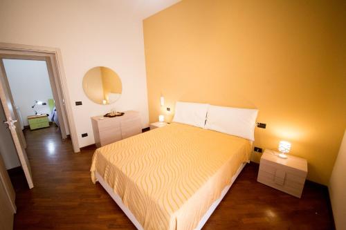 Sicilia Case Vacanze tesisinde bir odada yatak veya yataklar