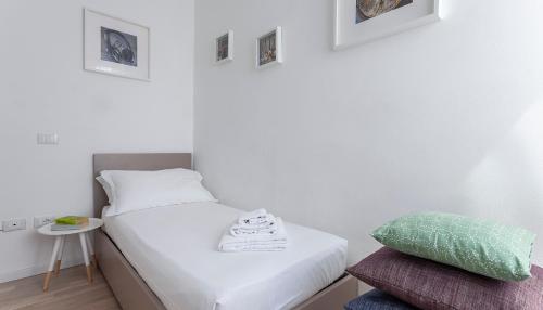 A bed or beds in a room at Italianway-Volta