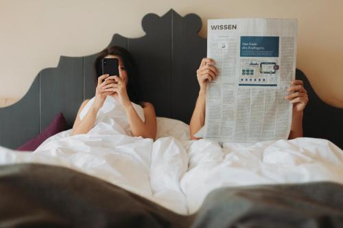 Bergland Design- und Wellnesshotelにあるベッド