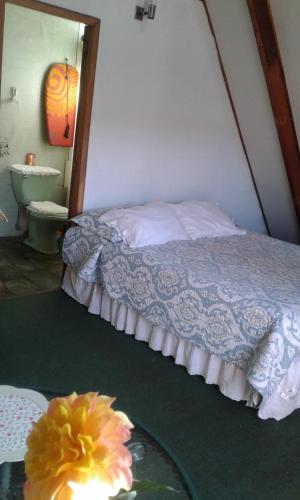 En eller flere senge i et værelse på Habitaciones Florencia