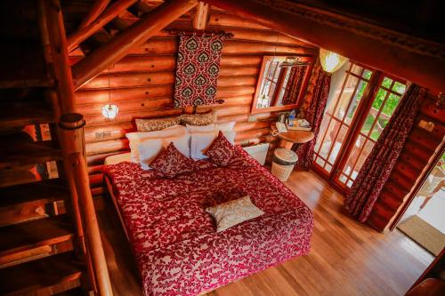 an overhead view of a living room in a log cabin at Queenswood Cottage in Nuwara Eliya
