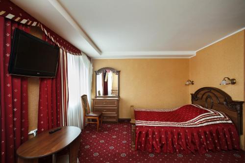 Krevet ili kreveti u jedinici u objektu Olginskaya Hotel