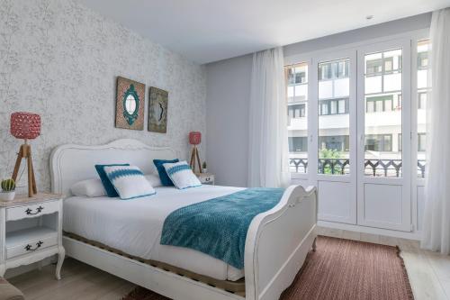 Ένα ή περισσότερα κρεβάτια σε δωμάτιο στο BMA by Forever Rentals